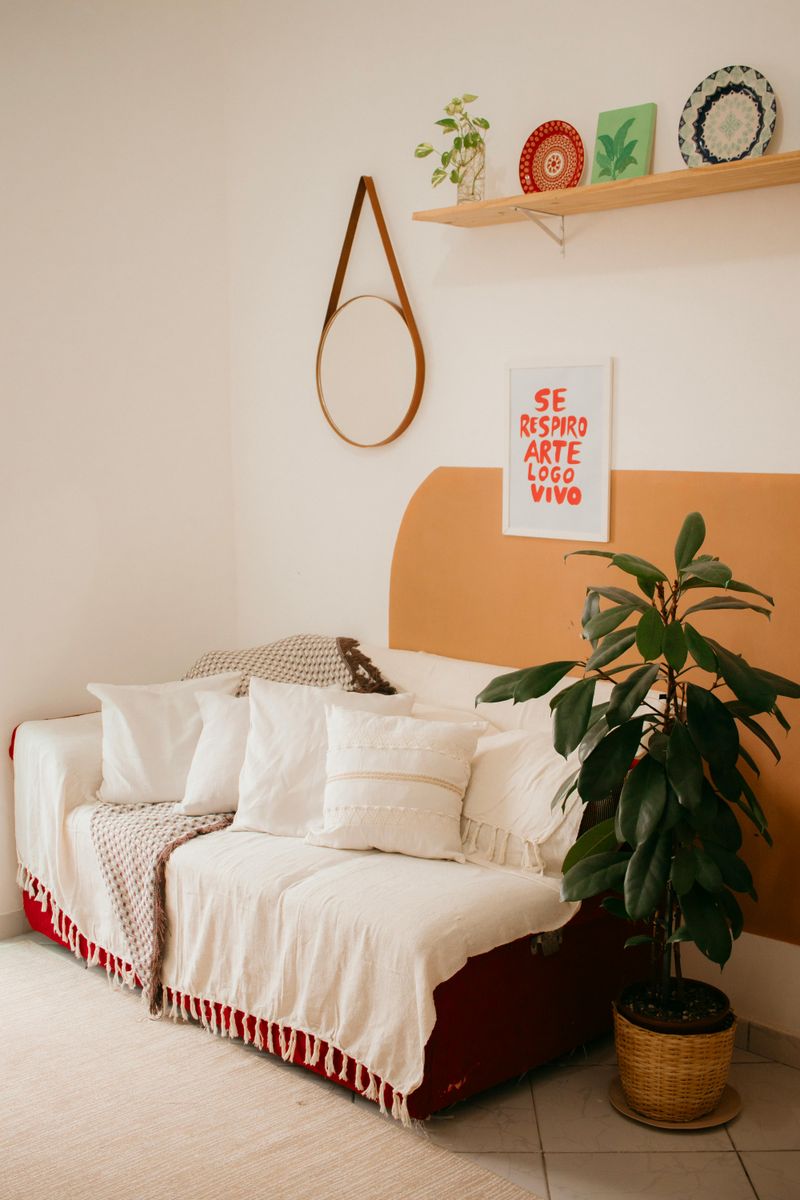 12 Tired California Living Room Trends Designers Say It's Time To Let Go - Decor Hint Excessive Throw Pillow Piles