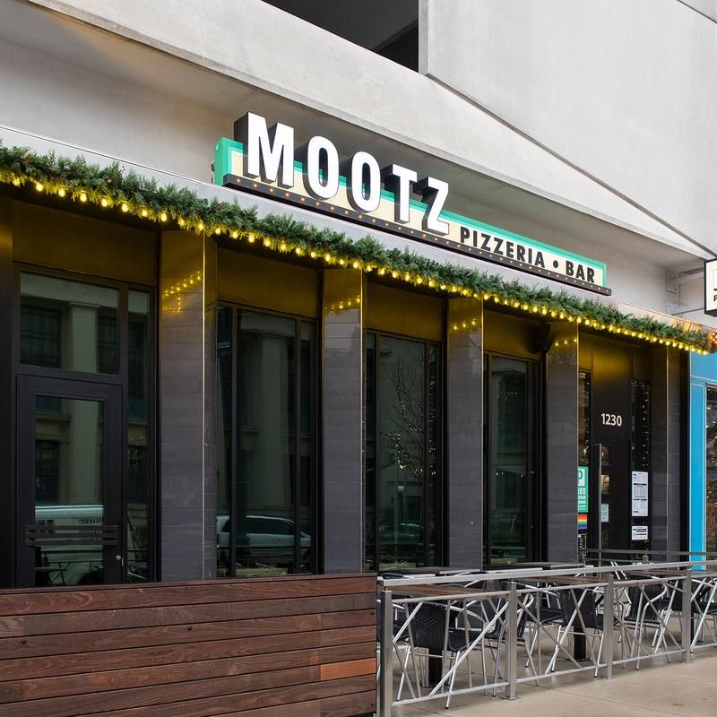 17 Michigan Spots Crafting Italian Subs So Big They're Practically Landmarks - Decor Hint Mootz Pizzeria + Bar