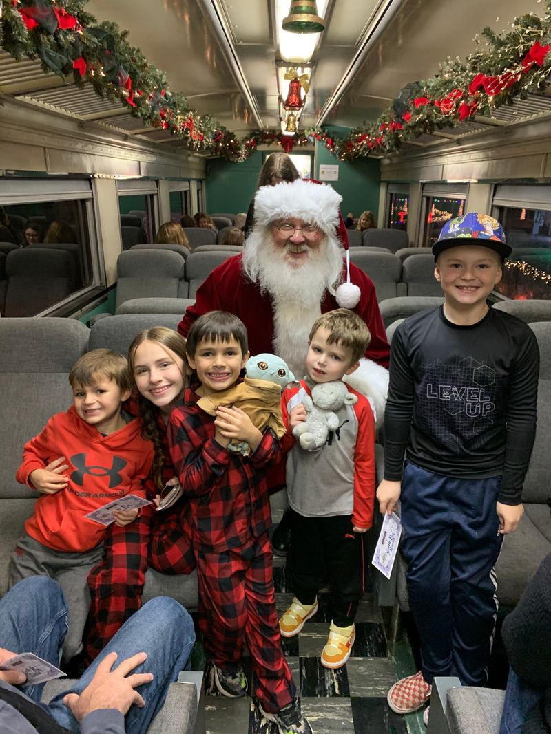 Ride The Rails To Christmas Cheer On Tennessee's North Pole Limited - Decor Hint Santa Boards The Train At The North Pole Stop