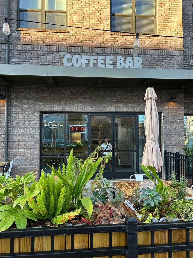 15 Feel-Good Cafés Across Georgia Where Cozy Vibes And Kittens Steal The Show - Decor Hint Peoples Town Coffee Bar