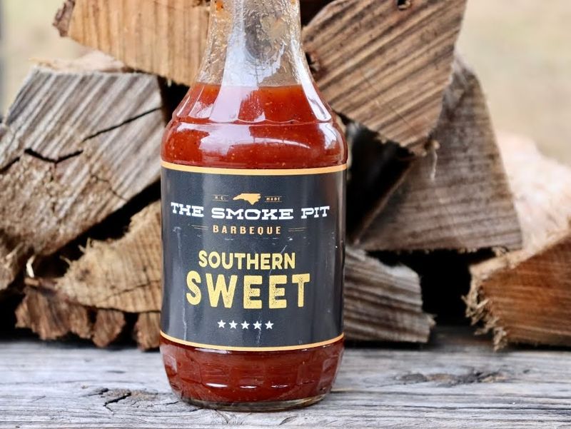 This North Carolina BBQ Joint Serves Burnt Ends Worthy Of A Foodie Pilgrimage - Decor Hint Sauce Selection That Covers Every Preference