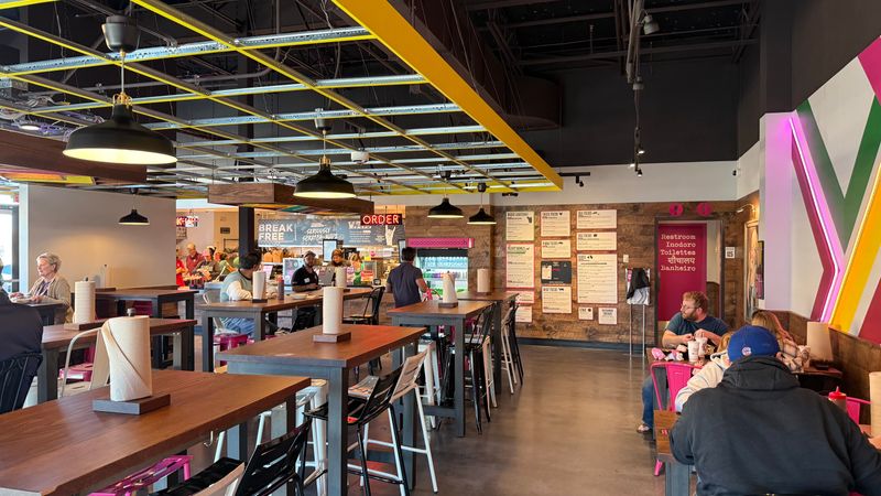 Vibrant Atmosphere And Open Kitchen Design Enhance The Experience