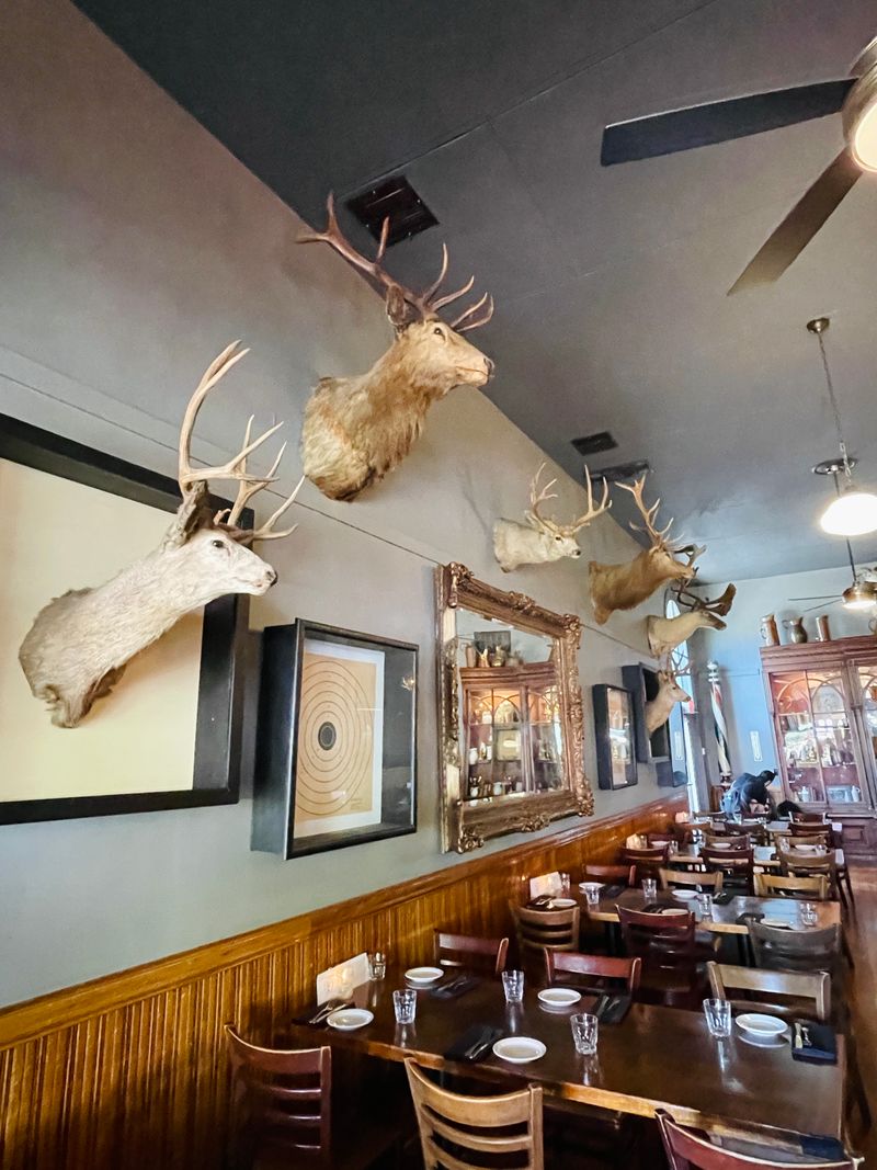 Trophy Game Heads And Rustic Décor Create Authentic Atmosphere