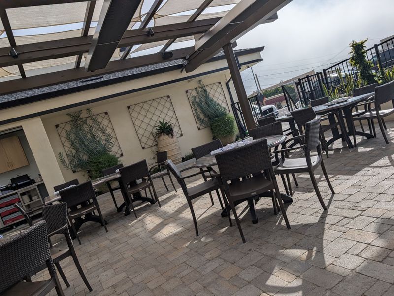 Pet-Friendly Heated Patio For Comfortable Outdoor Dining