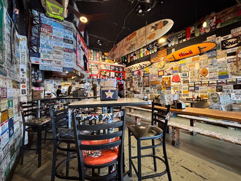 This Hole-In-The-Wall California Restaurant Is Famous For Its Giant Bacon Cheeseburgers - Decor Hint Surfboards Hang As Permanent Art Installations