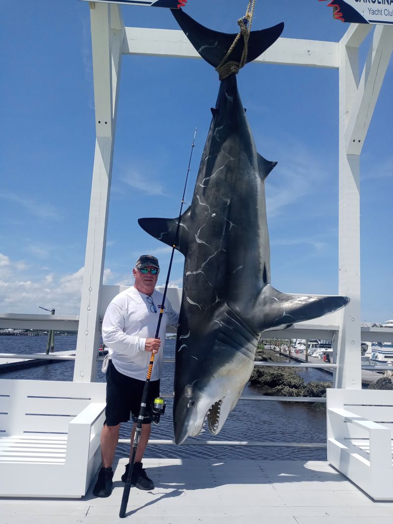 North Carolina Dining That Feels Like A Floating Escape - Decor Hint A Simulated Shark Catch Photo Zone