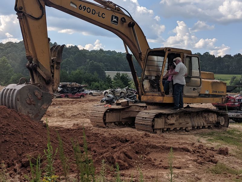 Demolish Buildings with Heavy Machinery
