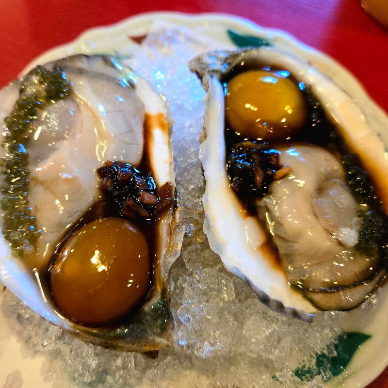 Adobo Oysters With Quail Egg Yolk Redefine What Oysters Can Be