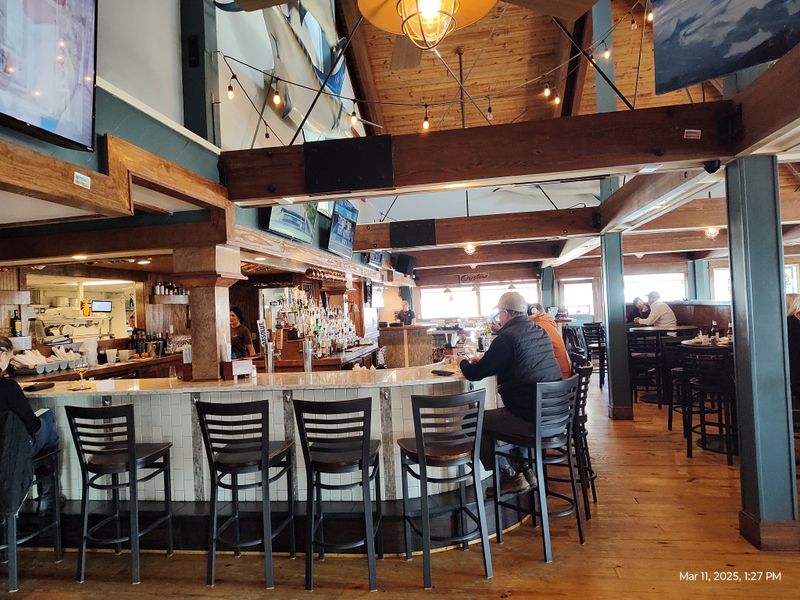 These North Carolina Spots Serve Cozy Waterfront Dining All Winter - Decor Hint Blue Water Grill & Raw Bar, Manteo