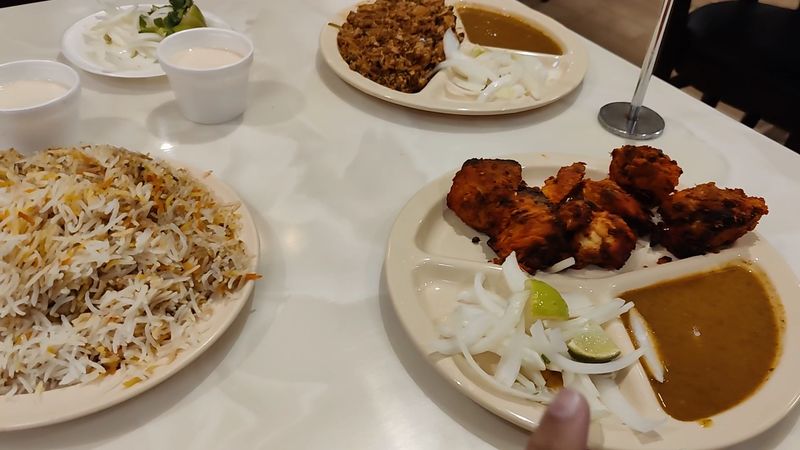 This Strip Mall Spot On Jimmy Carter Boulevard Might Have The Best Middle Eastern Food In Georgia - Decor Hint Signature Dish: Chicken 65