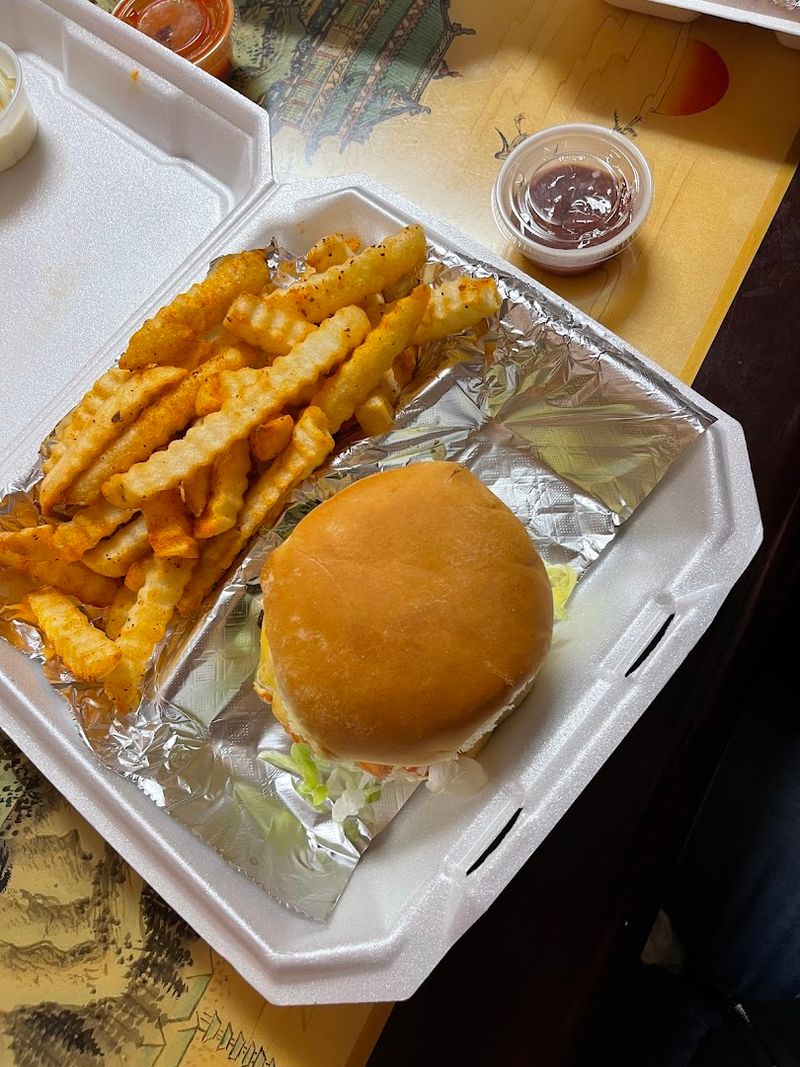 Slow-Smoked Pulled Pork Sandwich Piled High