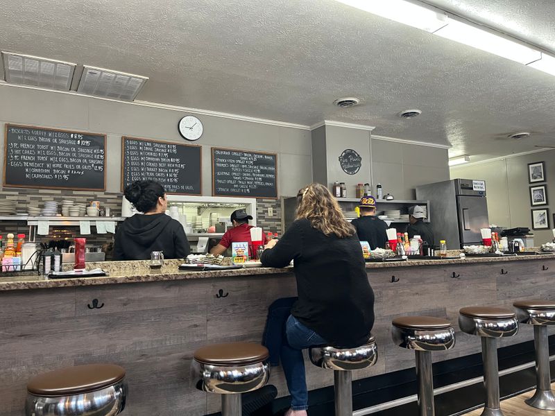 This North Carolina Tiny Restaurant Is A Must-Visit For Breakfast Omelets This Month - Decor Hint Counter Seating Offers Front Row Experience