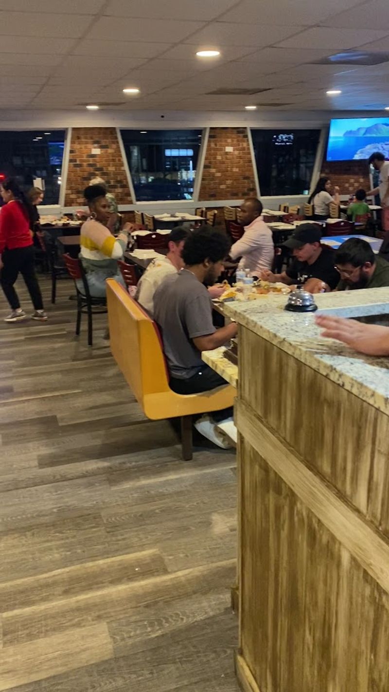 Spice Up Your Day At This North Carolina Indian Eatery Everyone's Talking About - Decor Hint Bollywood Music Videos Create Unexpected Atmosphere