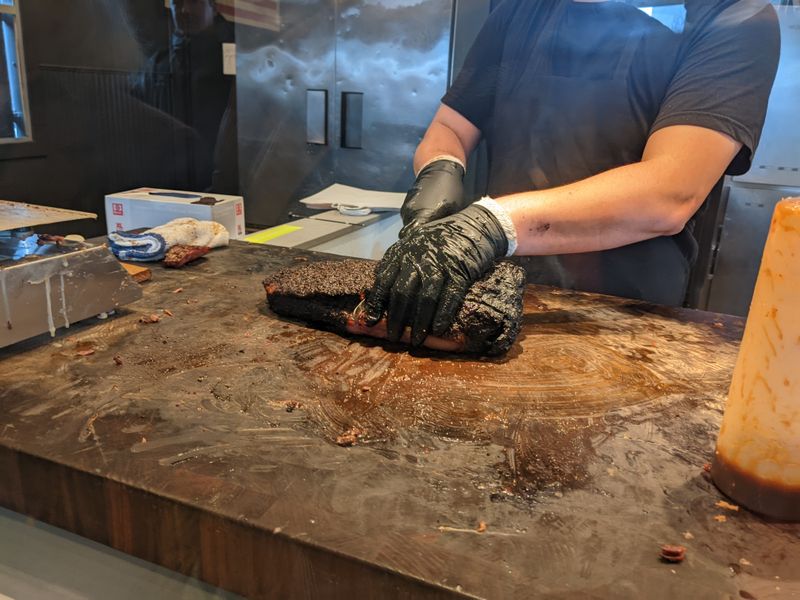 The Brisket Gets Smoked Over California Oak For 18 Hours