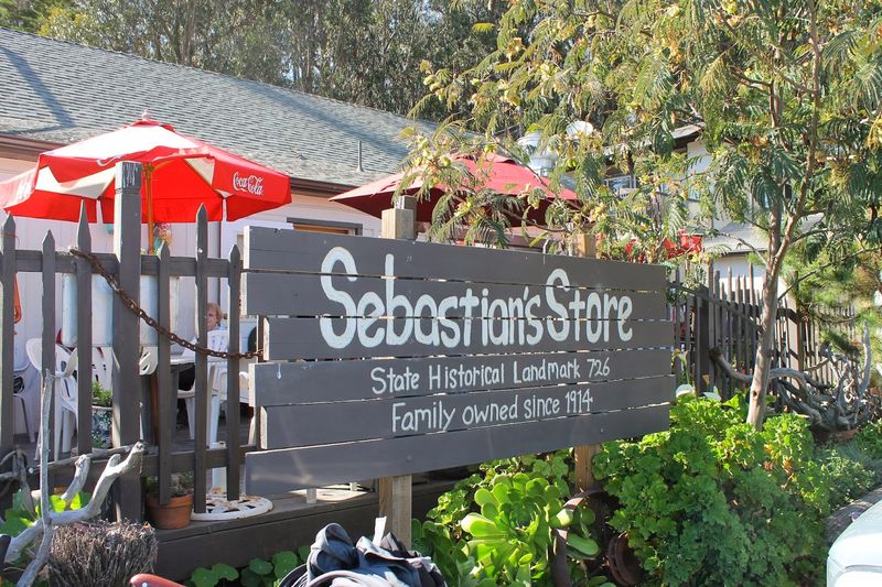 Shaded Outdoor Patio Overlooks Coastal Scenery