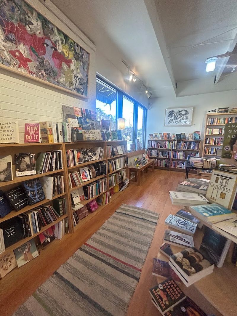 This North Carolina Bookstore Features Curated Picks & Poetry Readings In The Heart Of Raleigh - Decor Hint Local Art Integration Throughout The Space