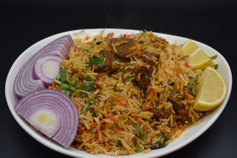 Spice Up Your Day At This North Carolina Indian Eatery Everyone's Talking About - Decor Hint Goat Biryani For Adventurous Palates