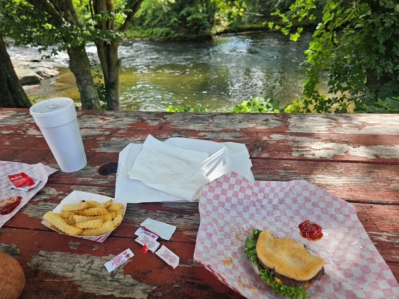 The North Carolina Burger Spot That Smoky Mountain Visitors Can't Miss - Decor Hint Riverside Setting Creates Memorable Dining
