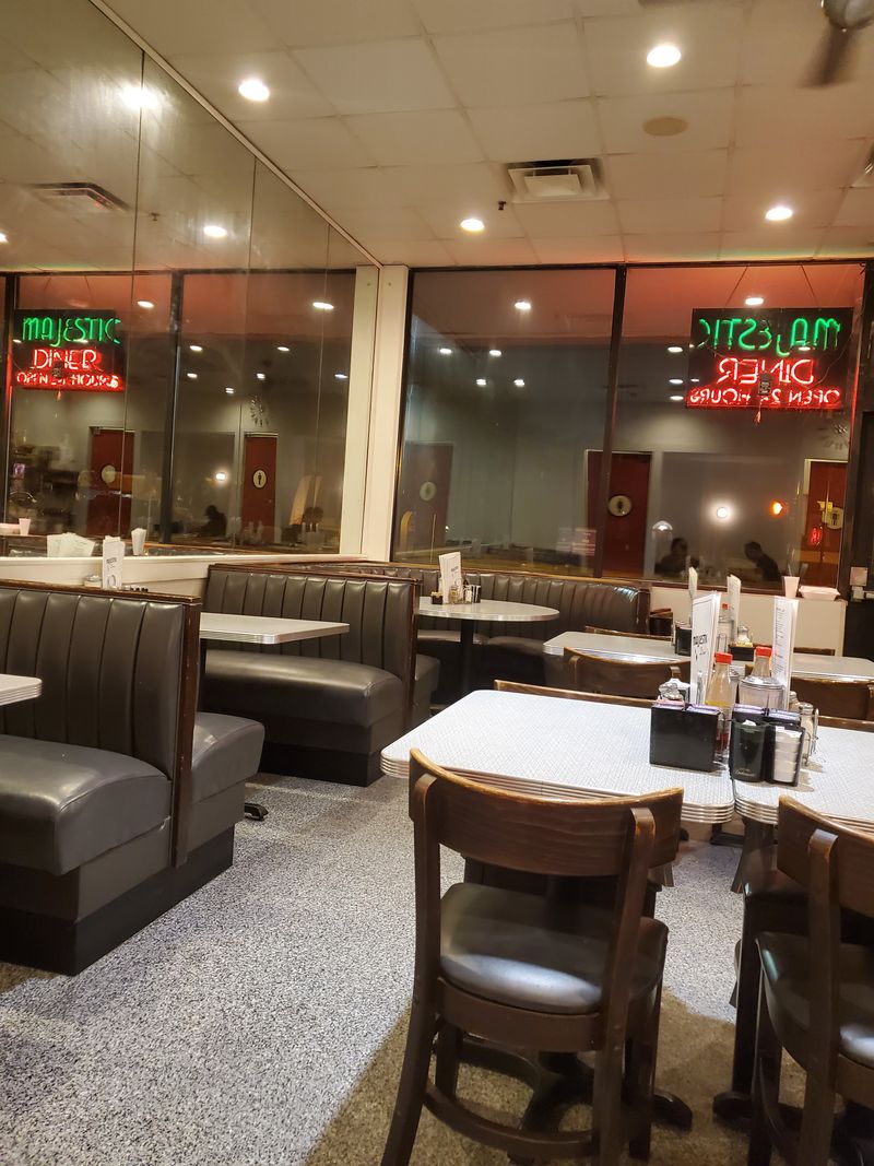 Wall Covered in Photos of Regular Customers