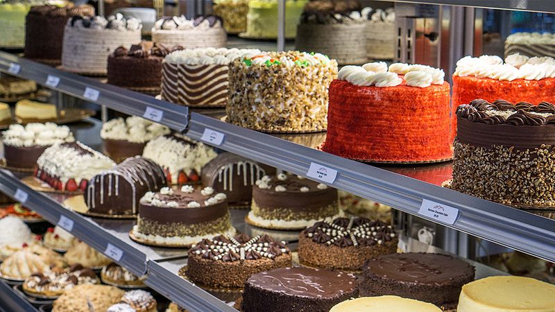 This Chocolatey Woodstock Georgia Bakery Doubles As A New York-Style Pizzeria Heaven - Decor Hint Inside The Bakery's Irresistible Display Cases