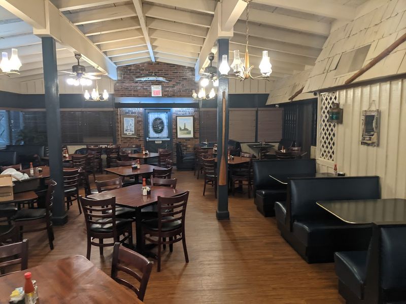 The Smell Of Fresh Fried Seafood Fills The Room