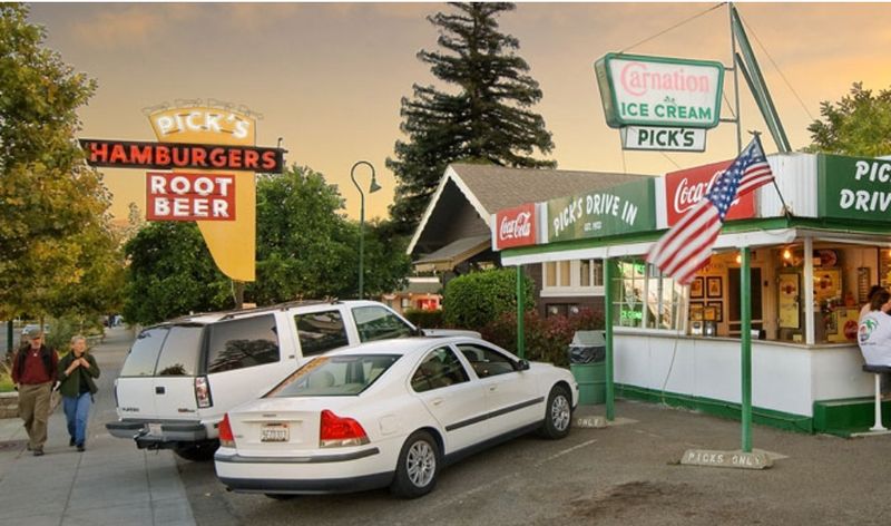 This Century-Old California Drive-In Still Serves Classic Roadside Burgers - Decor Hint The Iconic 1940s Neon Sign That Still Glows Today