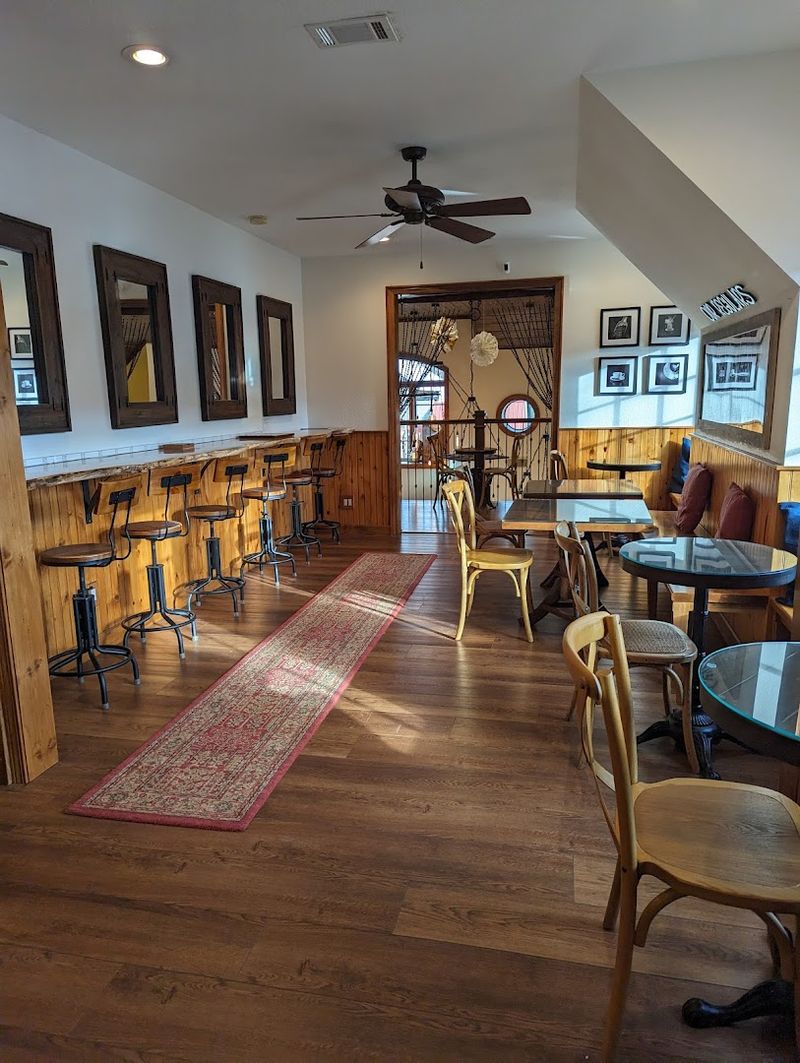 This Humble Georgia Coffee Shop Is Quietly Serving The Best Lattes In The State - Decor Hint Local Art Displays That Rotate and Inspire