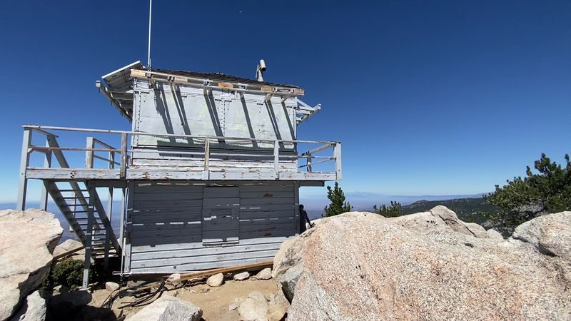 A Historic Fire Lookout Tower Still Stands At The Summit