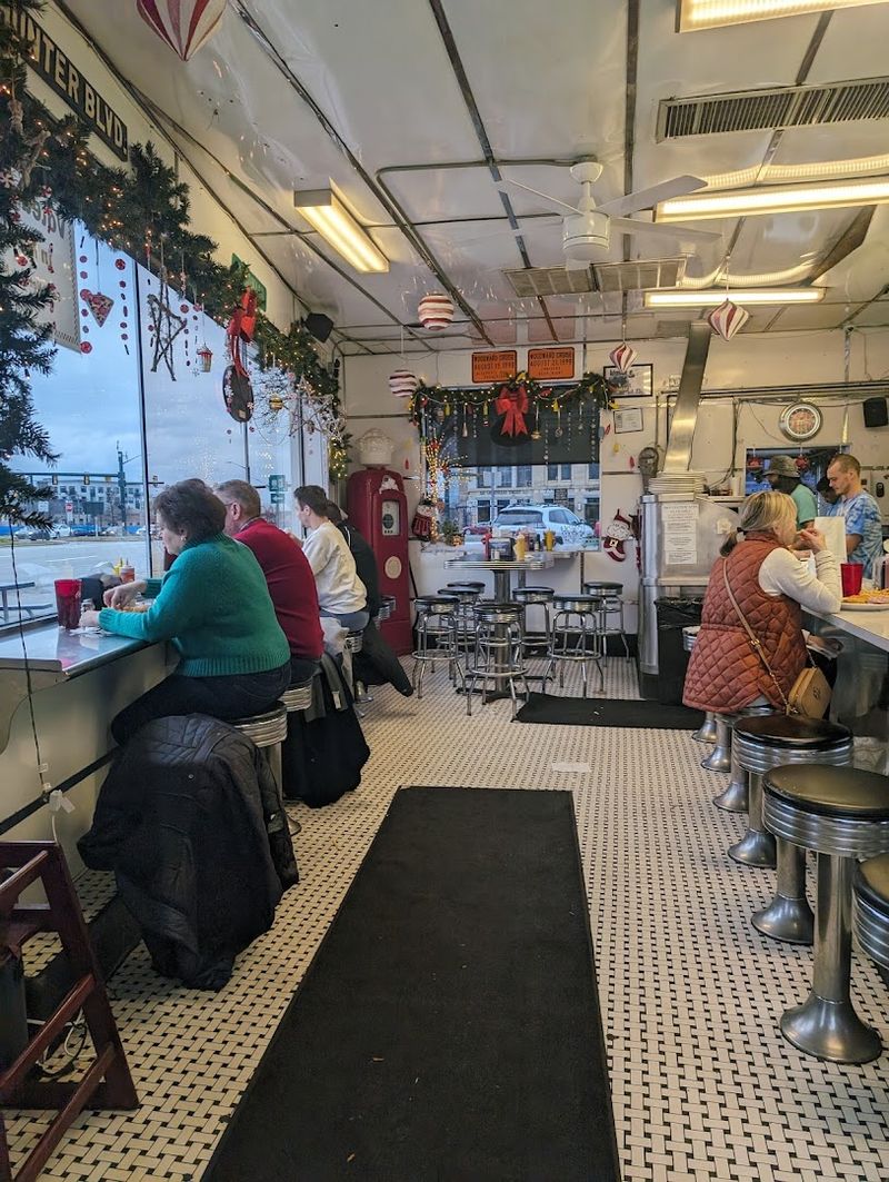 Locals Swear This Michigan Burger Joint Is Worth The Wait - Decor Hint The Loyal Regulars Who Make The Room Feel Alive