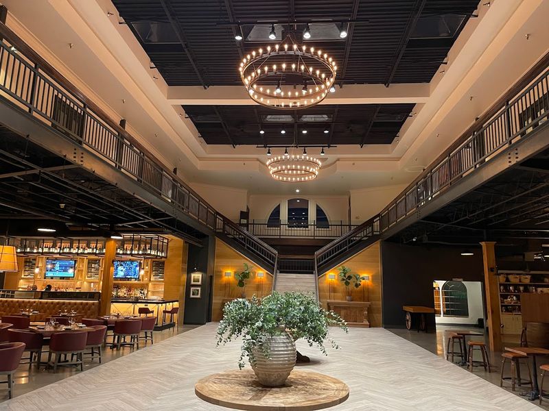 Elegant Ambiance With Industrial and French Oak Accents