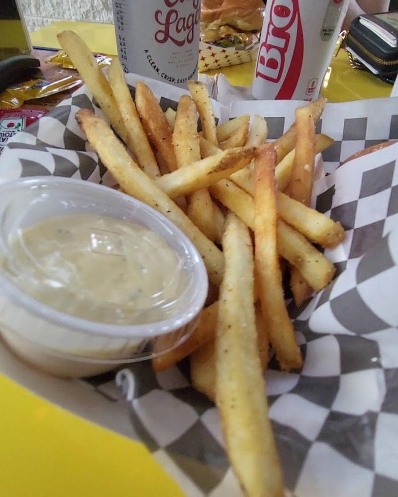 Step Into Smiley's Burger Club In Decatur Georgia Where Slushies, Smiley Fries, And Burgers Steal The Show - Decor Hint Smiley Fries That Are Basically Tater Tots With a Personality