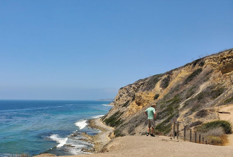 Cliffs Drop Straight Into The Water Along The Entire Path
