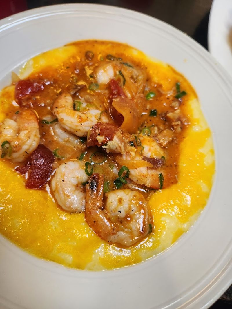 The Signature Shrimp And Grits Dish