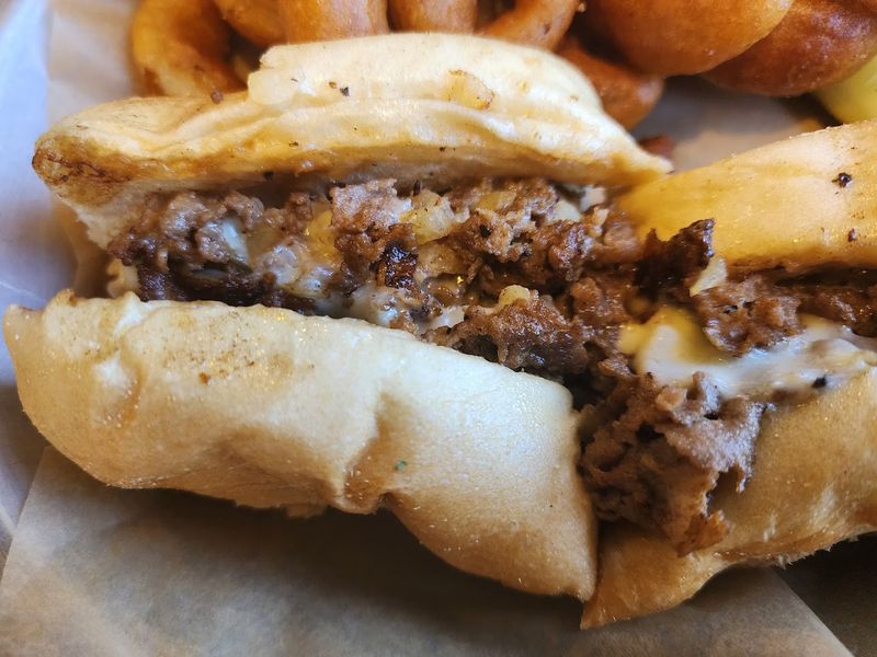 The Unassuming Restaurant In Georgia Locals Believe Has The State's Best Cheesesteaks - Decor Hint Renowned Cheesesteaks Worth the Drive