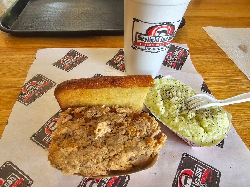 This North Carolina BBQ Sandwich Is Worth The Drive Every Time - Decor Hint That Chopped Pork Sandwich Up Close