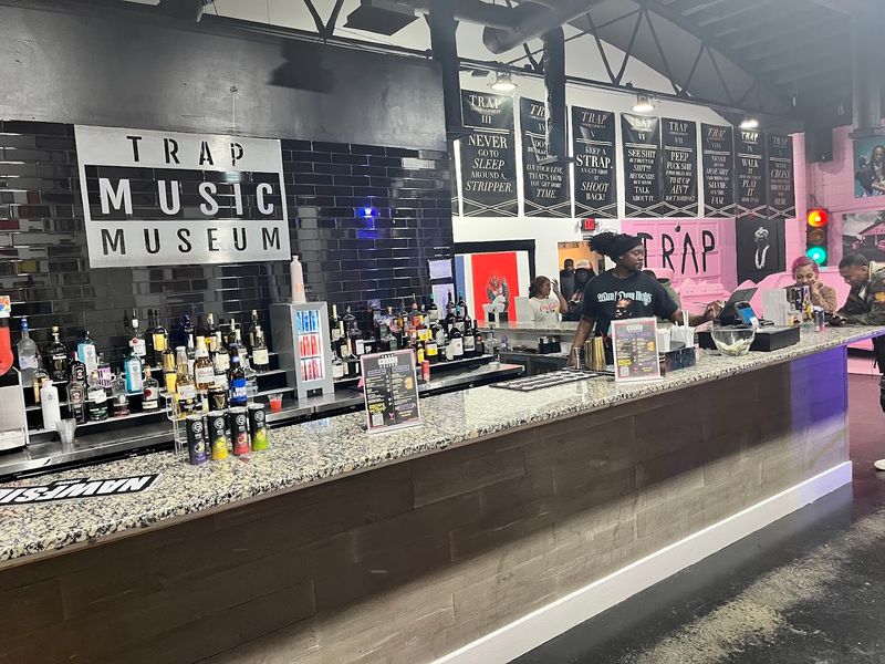 You Can Actually Escape A Trap House In Atlanta's Georgia First Trap-Themed Escape Room And Museum - Decor Hint Exclusive Merchandise Worth Taking Home