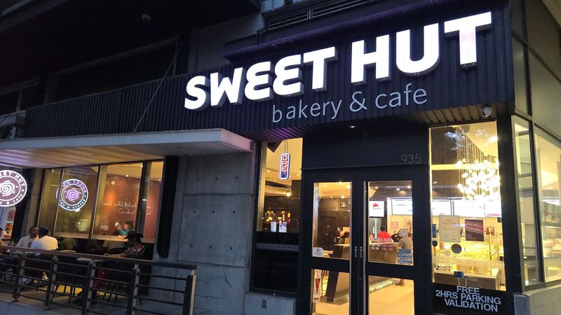 A Modern Cafe Atmosphere With Plenty Of Seating