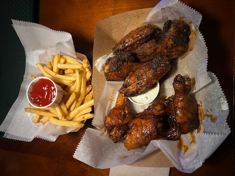Wing Lovers This Atlanta Georgia Dive Bar Serves The City's Most Famous Smoked Wings - Decor Hint The Wings Here Are Absolutely Worth It