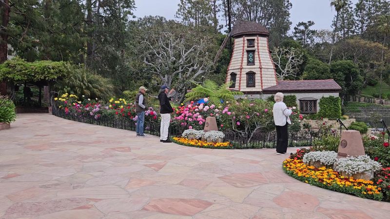 Lush Gardens With Waterfalls And Flower Beds