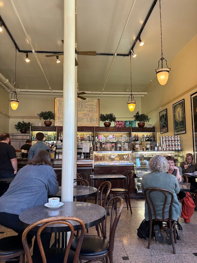 This San Francisco, California Coffeehouse Feels Like Europe With Authentic Italian Desserts - Decor Hint The European Atmosphere That Sets It Apart