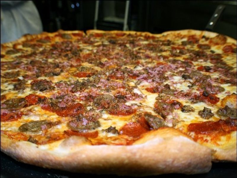 This Legendary Georgia Pizzeria Serves 30 Inch Pizzas Worth The Hype - Decor Hint The Famous Carnivore Challenge Featured on Travel Channel