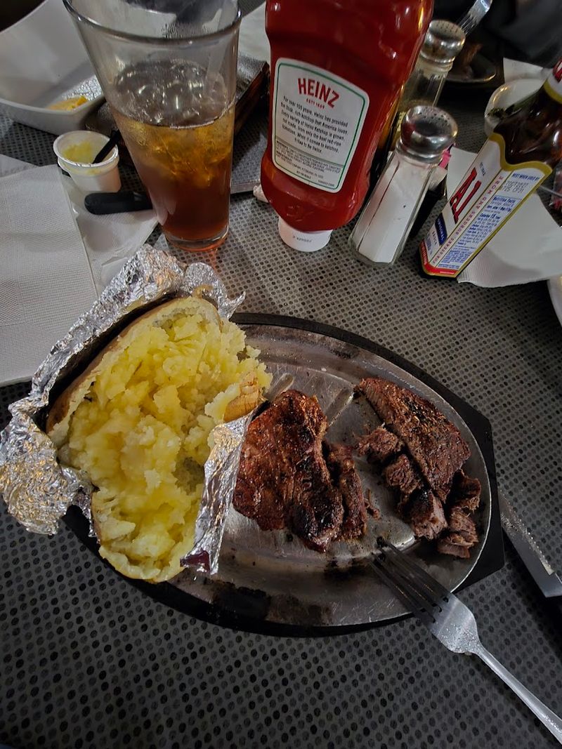 This Quiet North Carolina Steakhouse Builds Its Menu Around Big, Juicy Steaks - Decor Hint Baked Potatoes Done The Old School Way