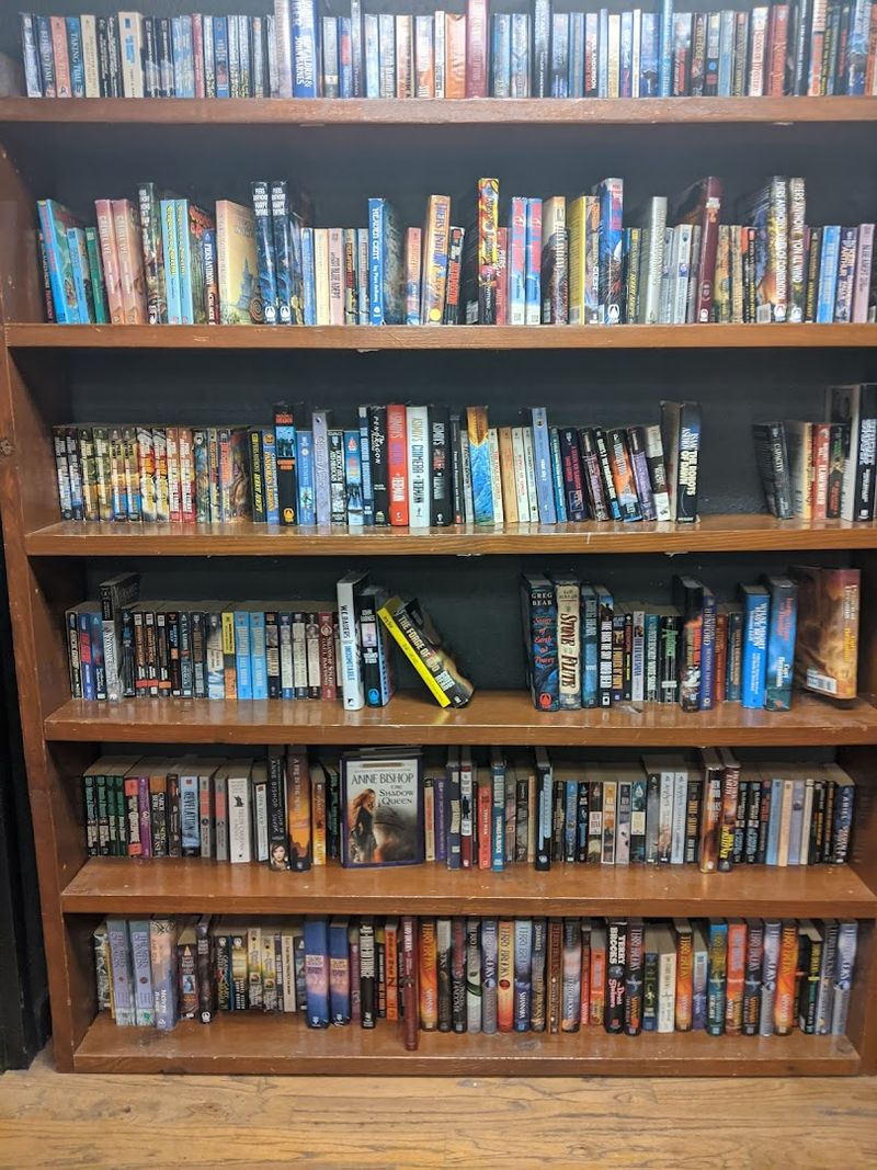 This Giant Georgia Bookstore Makes It Easy to Bring Stacks of Books Home - Decorating Tip The sci-fi and fantasy subterranean section is its own world