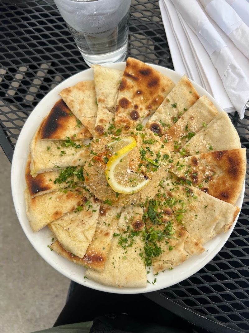 Warm Pita And Smooth Hummus