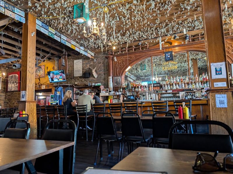 The Ceiling Covered in Dollar Bills