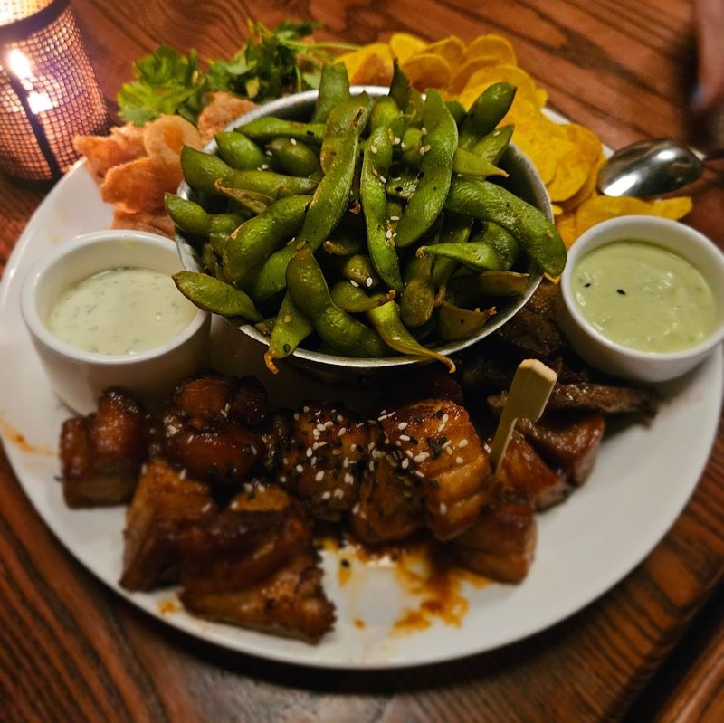 If You Haven't Eaten Inside A Tropical Lagoon In California, You're Missing Out Big Time - Decor Hint The Menu Leans Into Polynesian Fusion