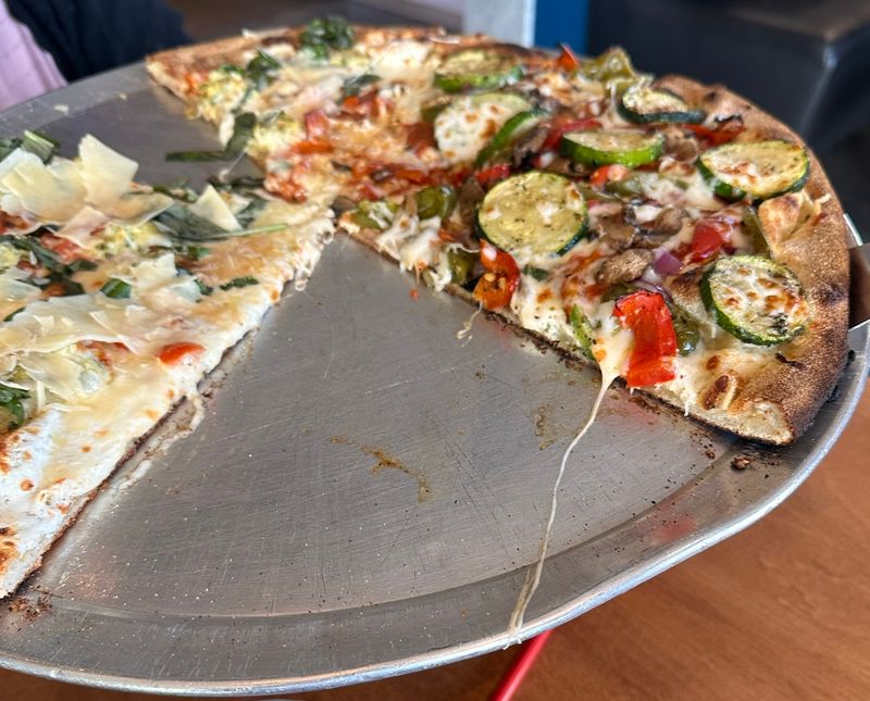 14 Texas Pizza Places Serving Slices You'll Dream About - Decor Hint Goodfellas Pizza Pasta Vino
