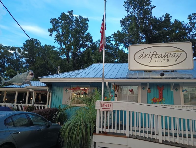 This Georgia Coastal Café Is A Must-Visit For Fish And Chips Fans - Decor Hint Outdoor Seating With a Jungle Oasis Feel