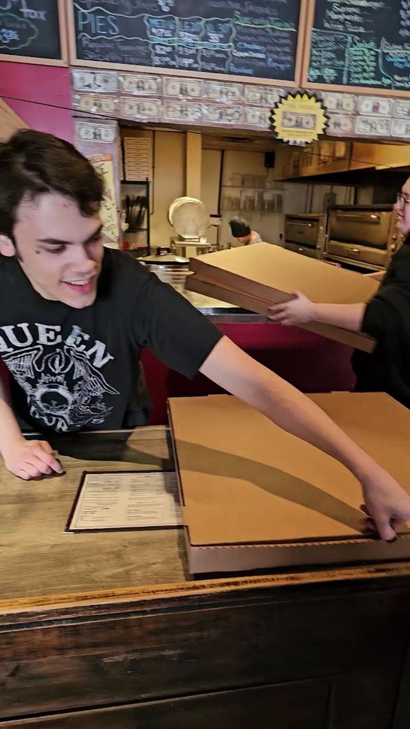 This Legendary Georgia Pizzeria Serves 30 Inch Pizzas Worth The Hype - Decor Hint A Side Room That Hosts Parties Up to 50 People