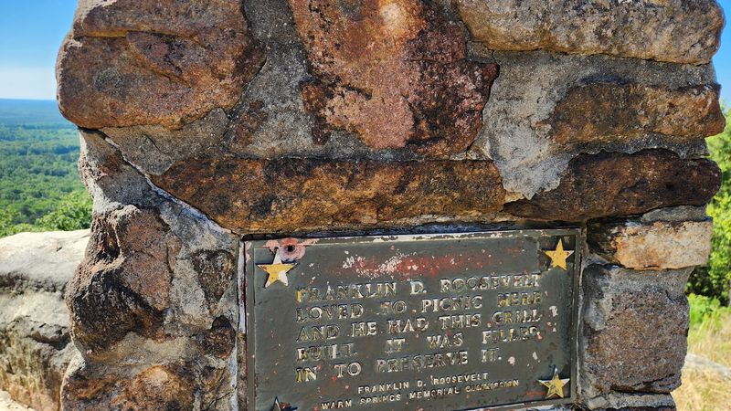 A Stone Grill With Presidential Fingerprints On It